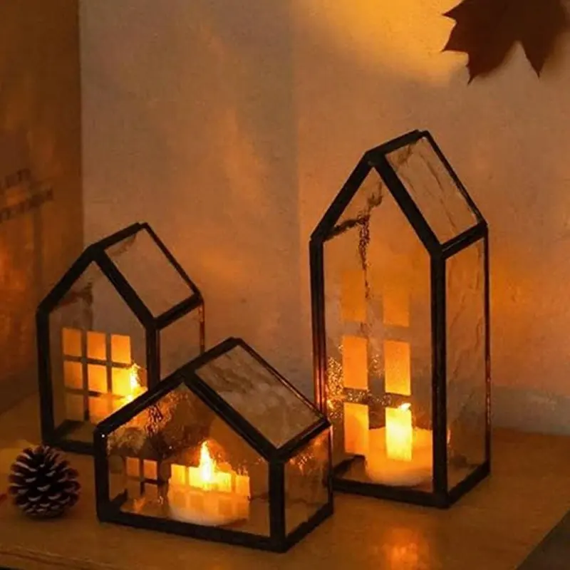House candle holders styled in evening light; candles are not included