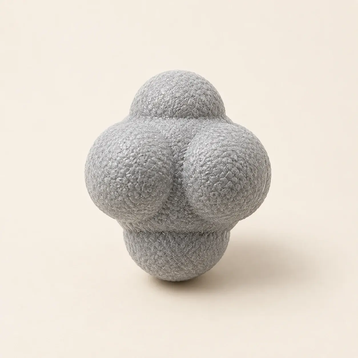 Six-Lobe Reaction Ball, selected product photographed on warm ivory