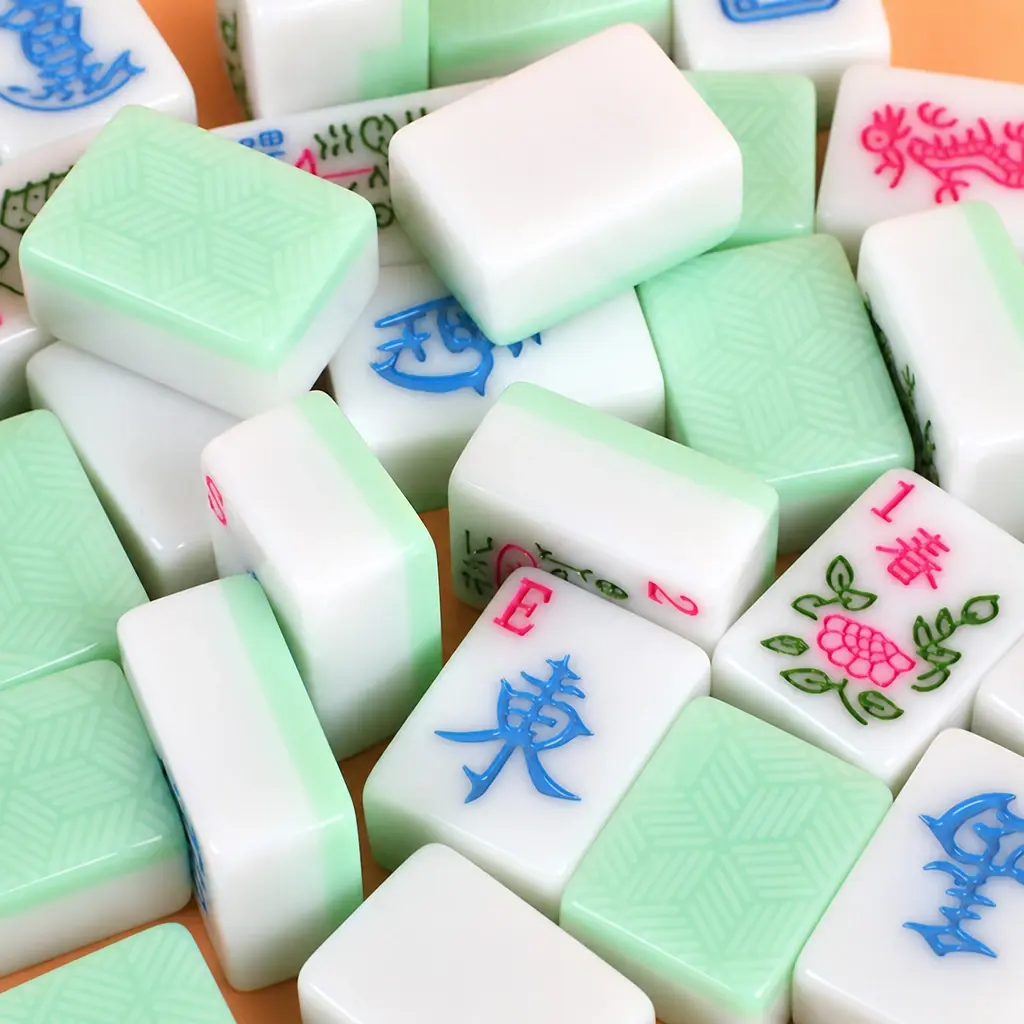 Mint patterned tile backs beside traditional ivory tile faces